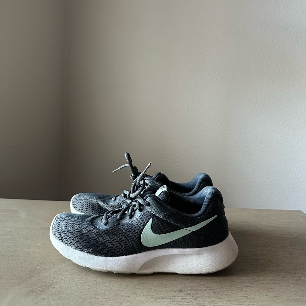 Teal and turquoise Nike running trainers